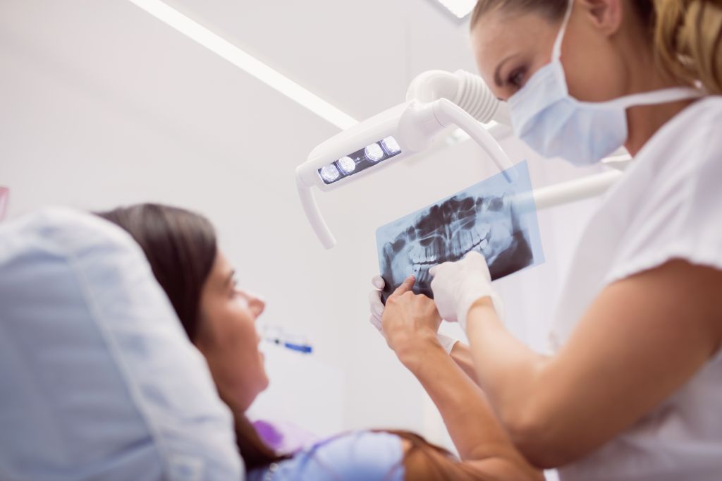 dentist-showing-x-ray-patient.jpg