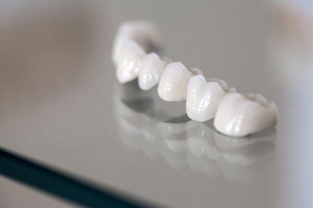 zirconium-porcelain-tooth-plate-dentist-store-photo.jpg